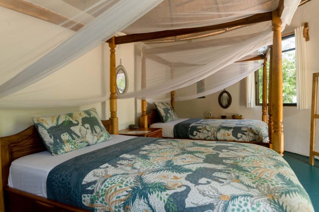 Round hut twin room at Atupele Cottages